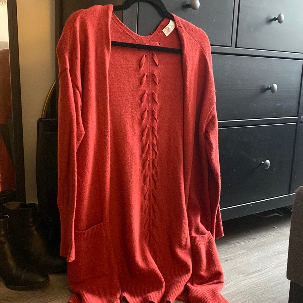 Mid-thigh red cardigan, worn once, size small.